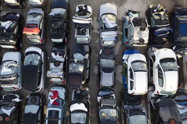 Aerial view of government vehicle auctions showing rows of repossessed cars and impounded cars at impound lot auctions for buying impounded cars