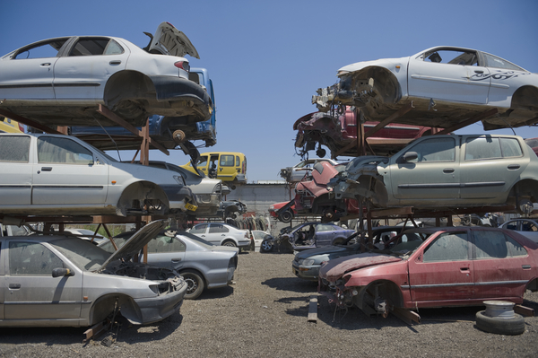 Impounded cars and seized vehicles lined up at government car auctions, showcasing abandoned cars waiting to be sold at police auctions